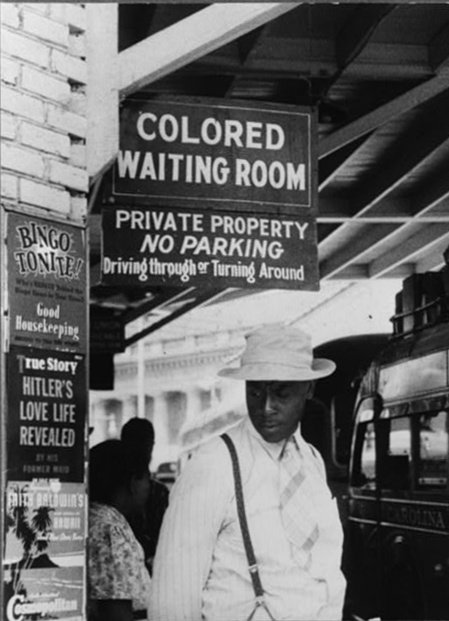 Colored waiting room sign in Durham, N.C.