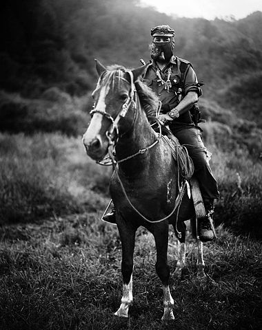 Subcomandante Marcos, pictured on horseback.